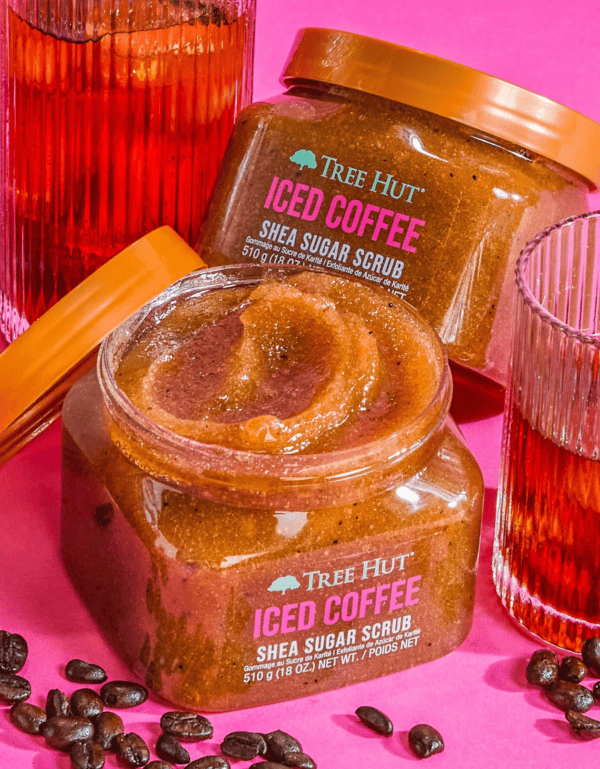 An open tub of tree hut iced coffee shea sugar scrub.