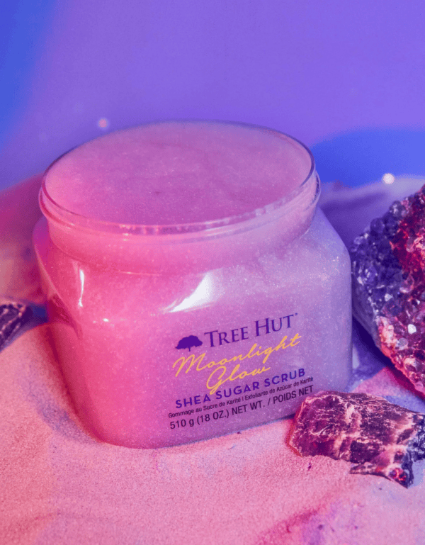 An open tub of tree hut moonlight glow shea sugar scrub.
